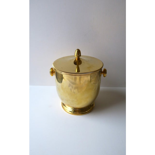 A chic Italian gold-plated ice bucket or wine/Champagne cooler by PM Italy, circa mid to late-20th century, Italy. Italian...