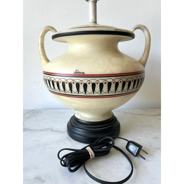 This vintage table lamp features an Alabaster Handled Urn design adorned with Greek Krater Style Decoration, signed by La...