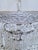 Hollywood Regency Vintage Crystal Upside Down Waterfall Chandelier With Ornate Silver-Tone Rim For Sale - Image 3 of 8