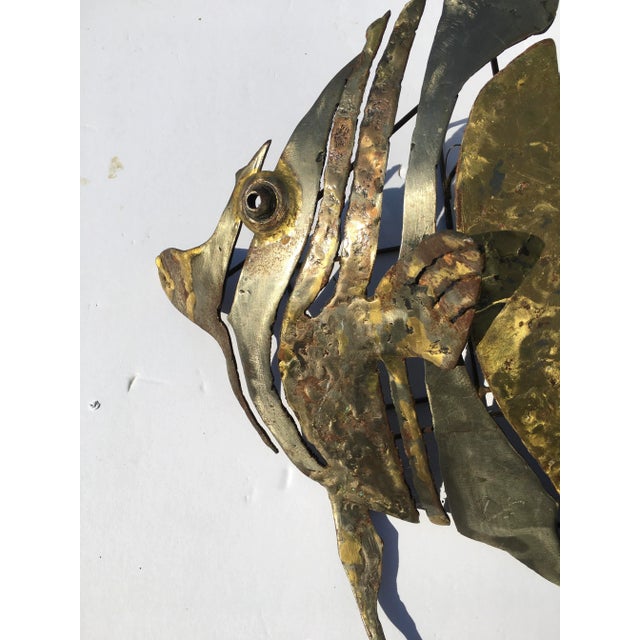 This original sculpture is hand crafted in iron and brass The sculpture is signed H. Gorda “Long Snout Butterfly Fish” is...