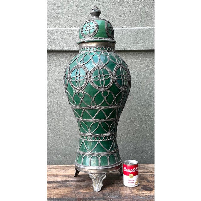 Capture the exotic allure of North Africa with this monumental Moroccan glazed ceramic urn. A masterclass in artisanal...