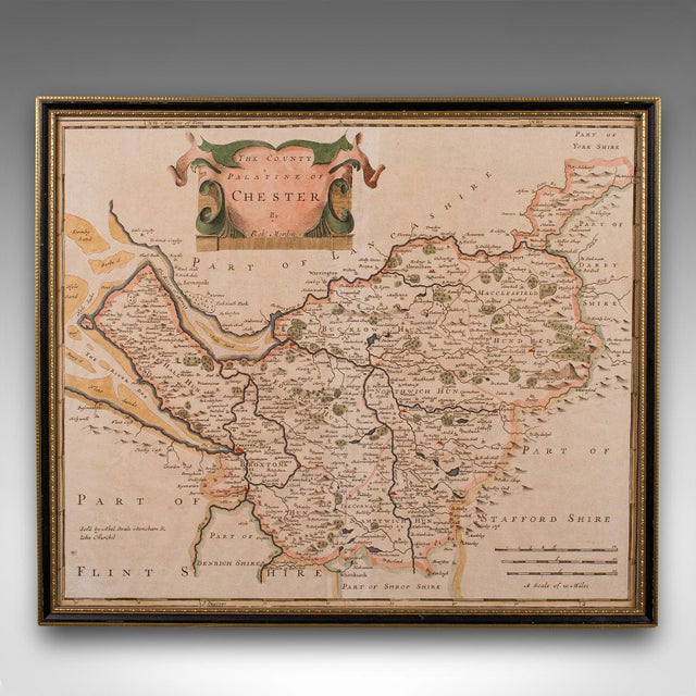 This is an antique county map of Cheshire, an English framed cartographic engraving by Robert Morden, dating to the early...