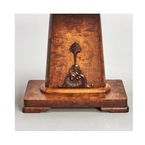 Antique Swedish Art Deco pedestal table in Honey colour golden birch veneer top and central pyramid leg in stunning tiger...