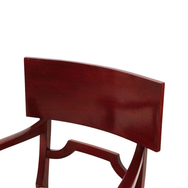 A refined pair of 1930s Continental armchairs showcasing the elegant restraint characteristic of early Art Deco design but...