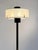 An exceptional tripod, modernist, fifties, bauhaus, shabby-chic lamp, Tripod base in black lacquered metal with 3...