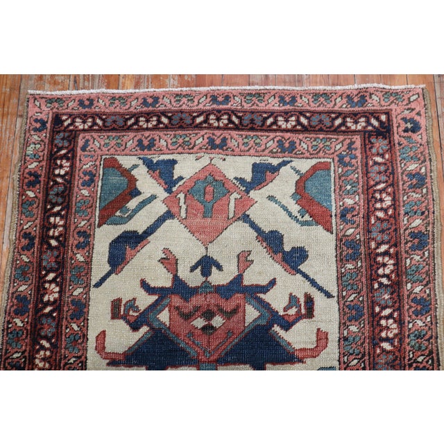 Late 19th century northwest Persian Heriz Serapi long runner. An ivory field with a tribal geometric pattern throughout...