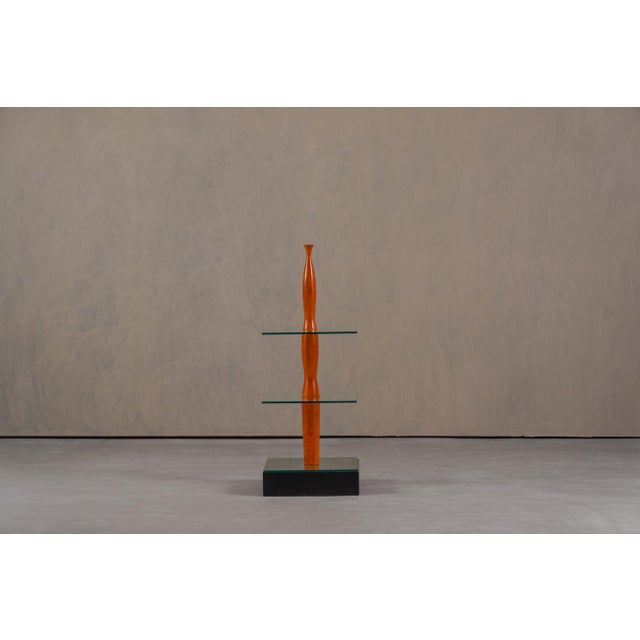 This Postmodern shelving unit from the The Colonnades collection was designed by Pascal Mourgue and produced by Artelano...