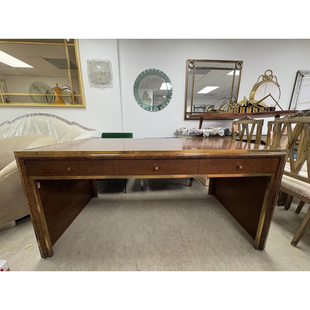 Italian Modern Desk Designed By Sandro Petti. Offered is an large handsome desk with brass trim and three drawers designed...