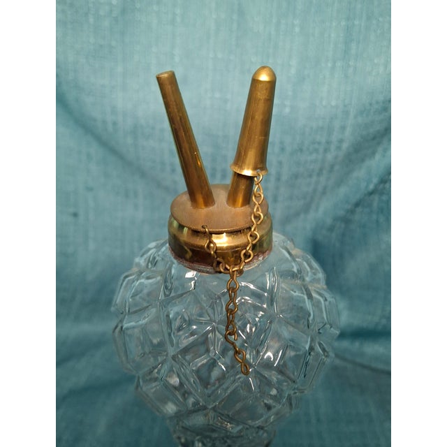 A Documented Piece of American Glass History: This exceptional mid-19th-century lamp is a confirmed product of the...