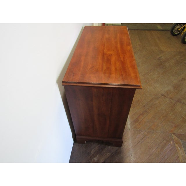 Item 87431: Stickley solid cherry serving chest or sideboard. Age: 1990"s. Details: Dovetailed drawers and a pullout...
