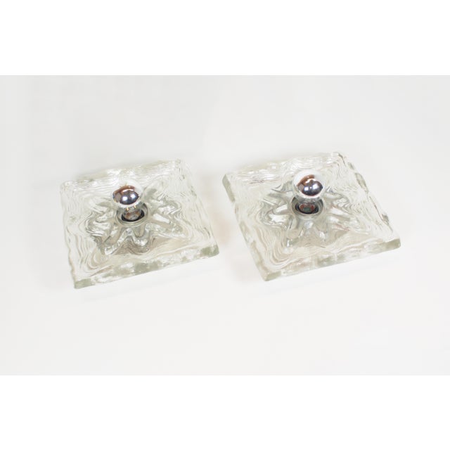 Large and heavy set of 'Ice Gas' wall lamps by Peill & Putzler, produced in Germany during the 1970s. Both are in very...