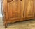 Vintage French Louis XVI Style Carved Oak 4-Door Armoire For Sale - Image 6 of 11