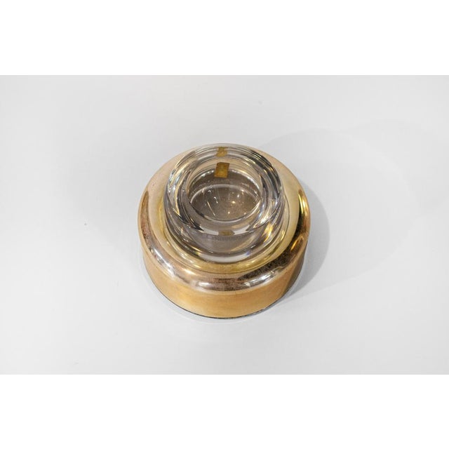 Crystal ashtray with gold-plated metal ring. Biglia model Designer Joe Colombo Manufacturer Arnolfo di Cambio Year 1968...