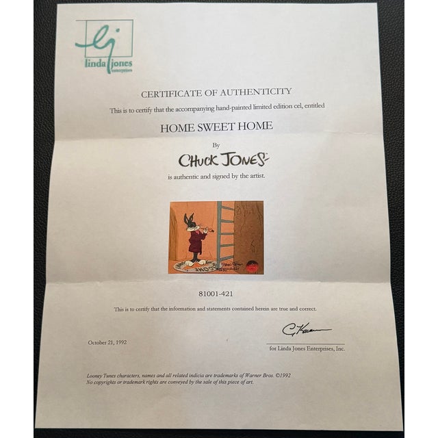 Home Sweet Home (1992), a limited-edition hand-painted Bugs Bunny cel signed by Chuck Jones, numbered 421/500. Includes...