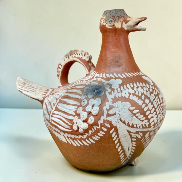 Mexican folk art ceramic ewer with goose form, with hand painted details 11” height 9” width 12” depth