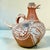 Mexican folk art ceramic ewer with goose form, with hand painted details 11” height 9” width 12” depth