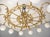 This impressive twelve-light chandelier dates to the 1980s and reflects a revival of classical decorative lighting forms...