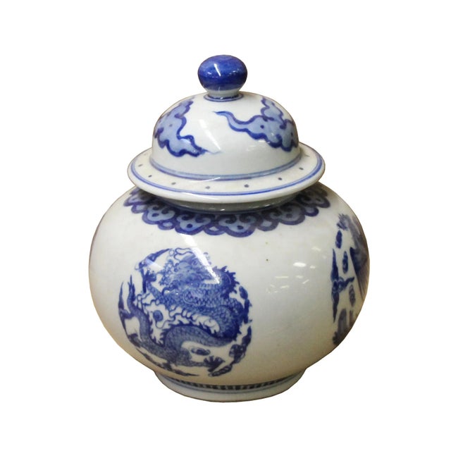 This is a handmade traditional Chinese porcelain container box container urn with blue and white color phoenix dragon...