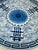 This is a beautiful large porcelain charger plate with a classic blue and white design, showcasing East Asian influence...