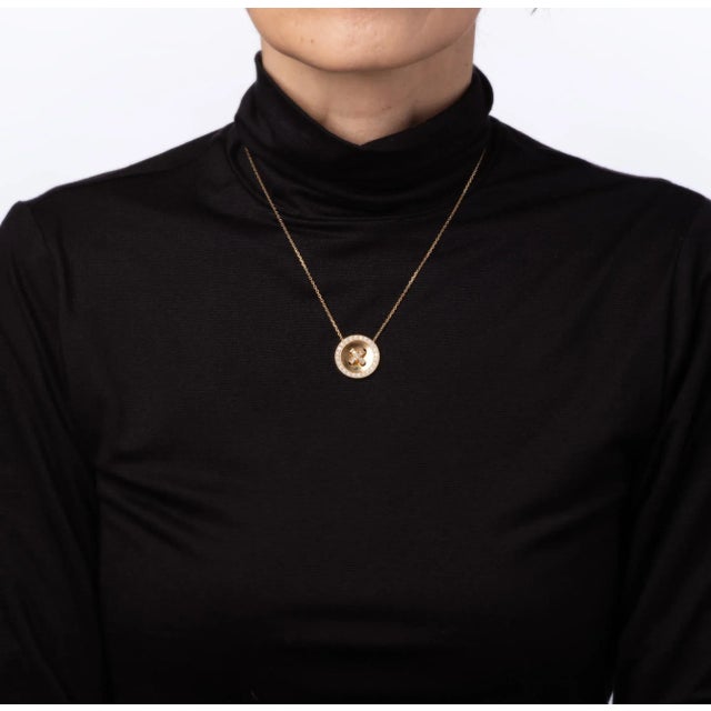 Stylish and finely detailed pre-owned Van Cleef & Arpels diamond button 'Boutonniere' necklace crafted in 18 karat yellow...