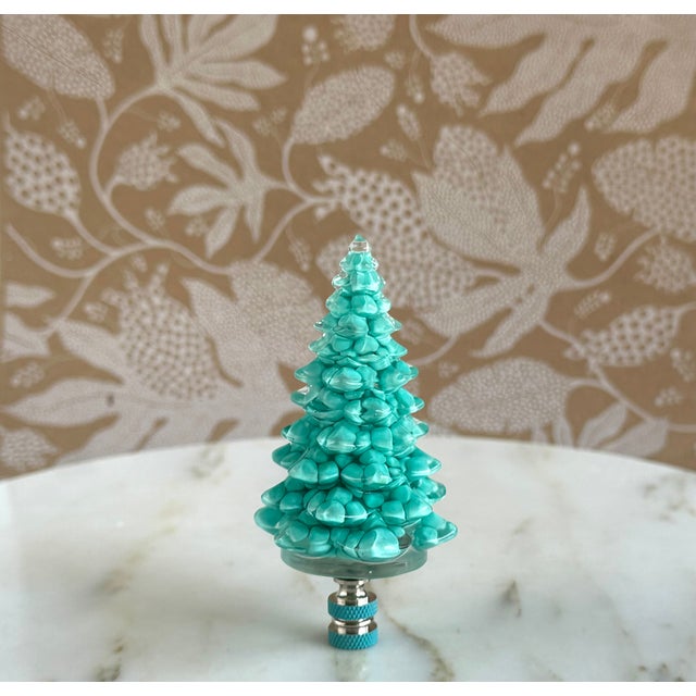Add an unexpected pop of holiday cheer to the top of your favorite table lamp with this designer lamp finial, hand-crafted...