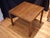 Offering a Mid-Century Modern side table by Founders Furniture. The piece features a classic Parsons design, with square...