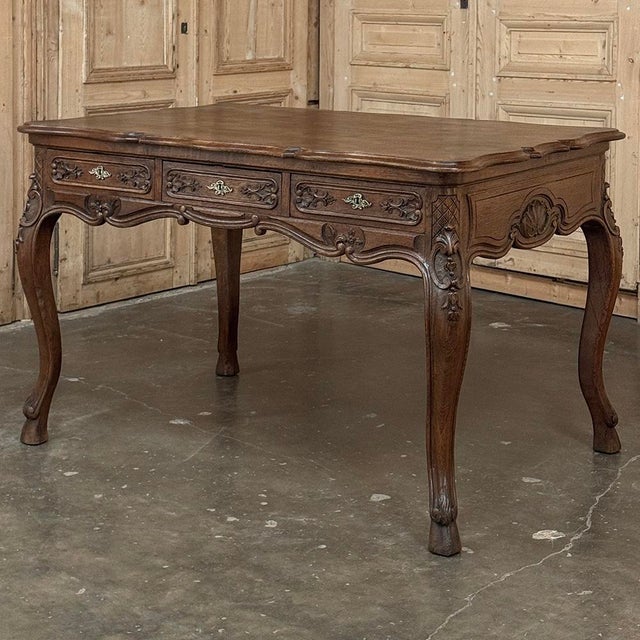 This refined Country French Liégeoise writing desk in the Louis XV style was crafted in solid white oak and beautifully...