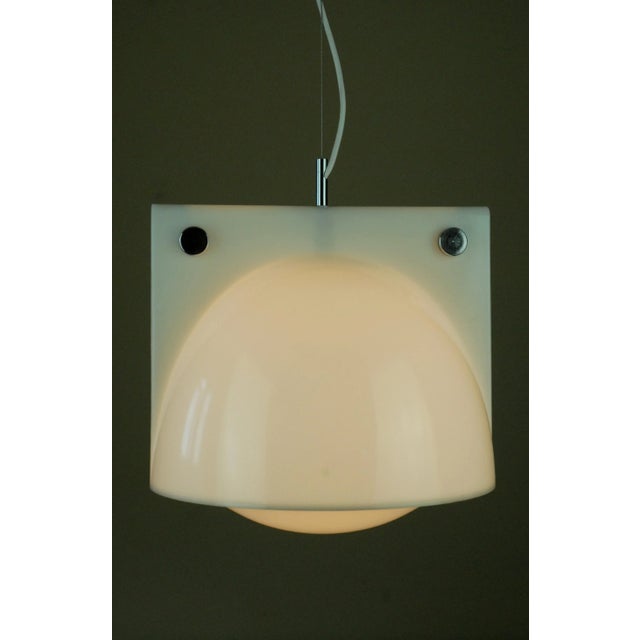 Rare Orione pendant designed by Sergio Brazzoli together with the architect Ermanno Lampa for Harvey Guzzini in 1970. This...