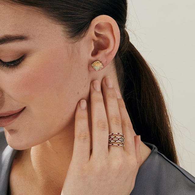 Created in 18 karat yellow gold Rubies 0.50 carat approx. Diamonds 0.15 carat approx. Band size US 7 Limited edition...