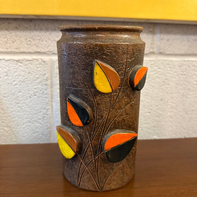 This decorative Italian Mid-Century Modern art pottery vase is by Aldo Londi for Bitossi. The vase was imported to The...