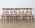A refined set of four Tuscan chairs dating from the late 18th to early 19th century, beautifully crafted in solid walnut....