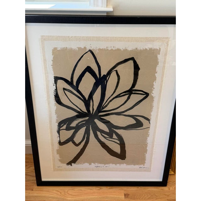 Large framed limited edition print — abstract black botanical motif on a beige textured ground. Pencil-signed (signature...