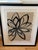 Large framed limited edition print — abstract black botanical motif on a beige textured ground. Pencil-signed (signature...