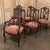 A set of six antique Liegeoise dining chairs, including one armchair, hand carved in solid oak and upholstered in hand...