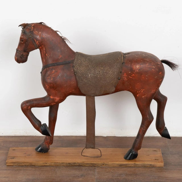 It is the very worn look that creates the wonderful appeal of this original painted and carved horse from Sweden. The...