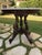 Beautifully refinished side table with mahogany stain. Solid Carrara marble top was also refinished and polished with a...
