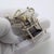 This vintage silver figurine depicts an antique coffee or pepper grinder with moving parts. Handcrafted in Arezzo, Tuscany...