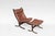 A classic 1970s Siesta lounge chair with ottoman by Ingmar Relling for Westnofa, crafted in Norway and widely recognized...