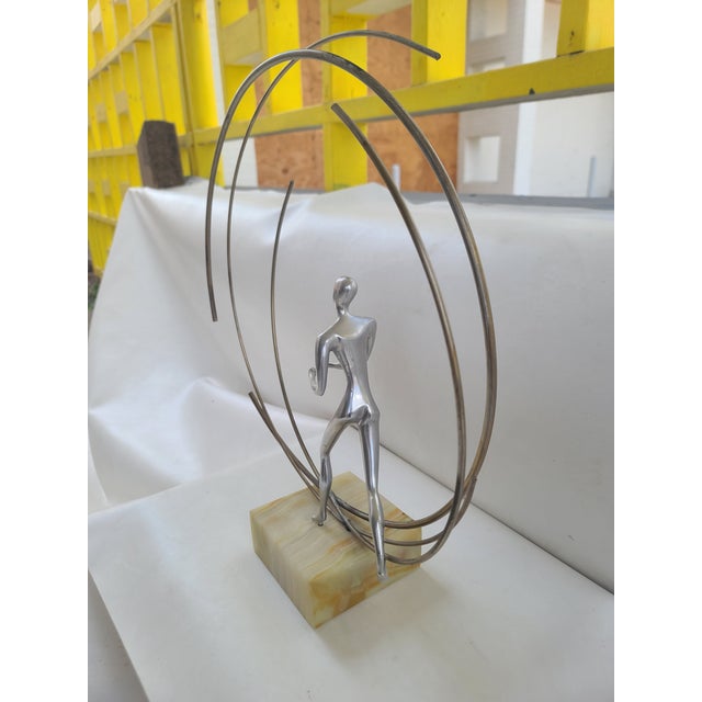 Signed Metal Sculpture on Onyx Base by Curtis Jere. Vintage Sculpture has a timeless modern feel. Chrome rings suggestions...