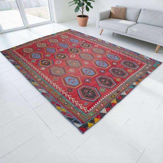 This monumental 1950s village kilim originates from the Sharkishla district of Sivas, a region in Central Anatolia...