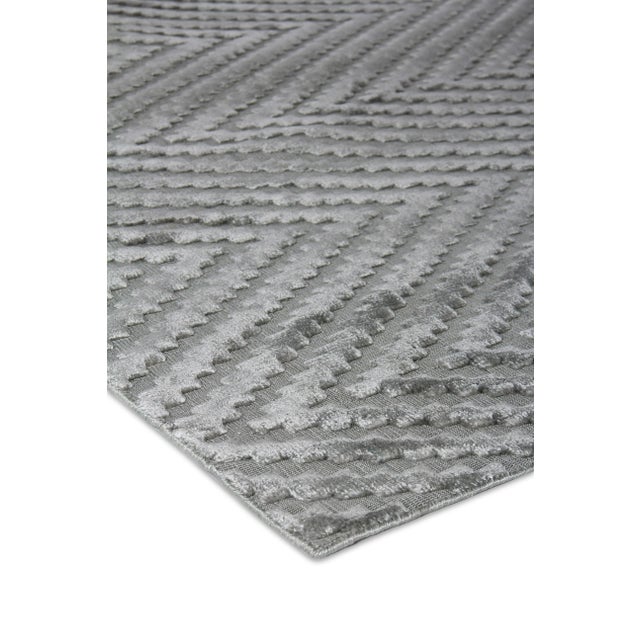 Simple, yet sensational! The plush, silky texture and the luxurious sheen of the Smooch rug make it more than another...