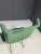 An iconic shell chair from the 1960s. The ergonomically shaped fiberglass shell rests on a slender metal base, newly...