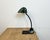 Vintage green enamel bauhaus table lamp made by bur ( bünte und remmler ) in germany during the 1930s. Cast iron base....