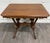 This is a gorgeous antique Victorian Eastlake library table crafted in solid oak, featuring a distinctive trestle base...