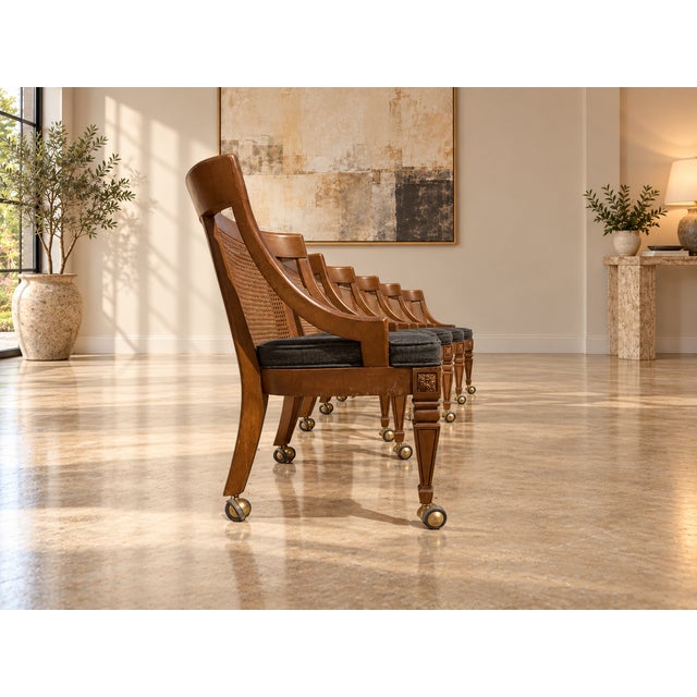 An exceptional six-piece collection of vintage Regency Revival-style armchairs, believed to date from the 1960s–1970s....