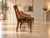 An exceptional six-piece collection of vintage Regency Revival-style armchairs, believed to date from the 1960s–1970s....