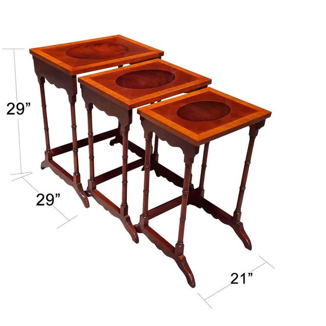 The Set of 3 Nesting Tables from Niagara Furniture features three tables, all with attractive inlaid mahogany tops....