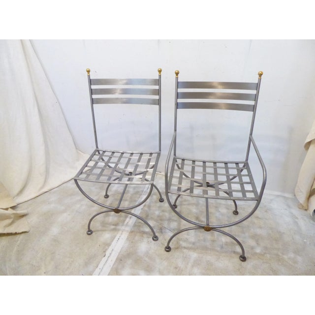 This set of 6 dining chairs, 2 arms & 4 sides, have cushions which raises the seat height to 18.5".