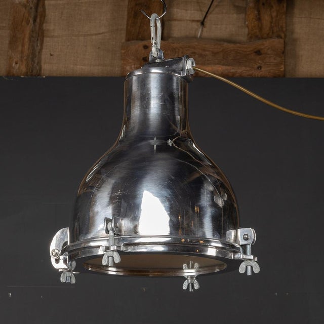 A fabulous polished aluminium light that once belonged to a Danish ship that circumnavigated the globe delivering cargo...
