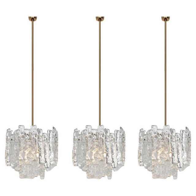 Very beautiful and elegant modern lights, manufactured by Kalmar Austria in the 1970s. Lovely design, each chandelier has...